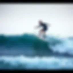 A surfer demonstrating perfect balance on a wave