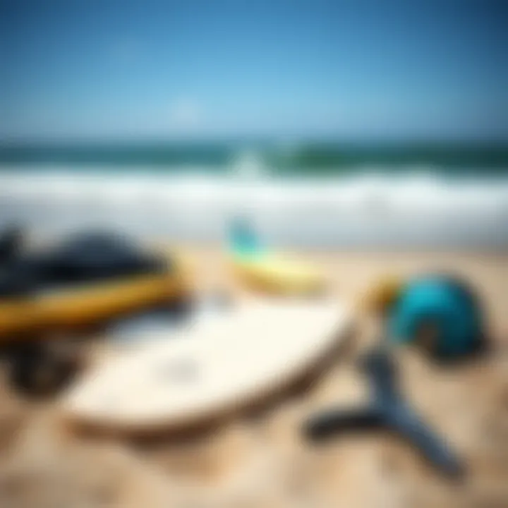 An array of essential surfing gear laid out on the sand
