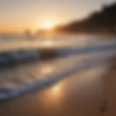 A serene beach at sunset with waves gently lapping the shore