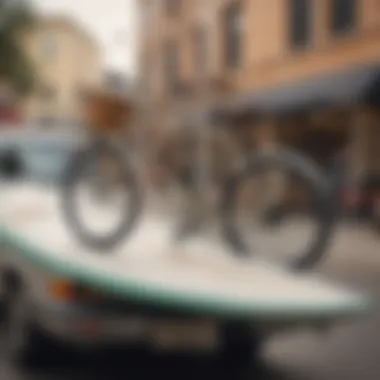 A close-up view of a surfboard mounted on a bicycle, demonstrating the secure attachment and stability during transit.