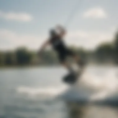 A group of wakeboarders performing tricks on the water