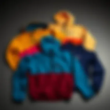 Different color options of the Patagonia Light Hoodie arranged aesthetically on a flat surface