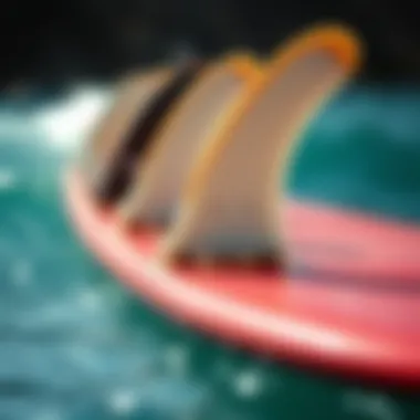 Close-up of surfboard fins influencing performance