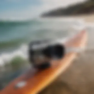 Close-up of a waterproof camera with surfboard