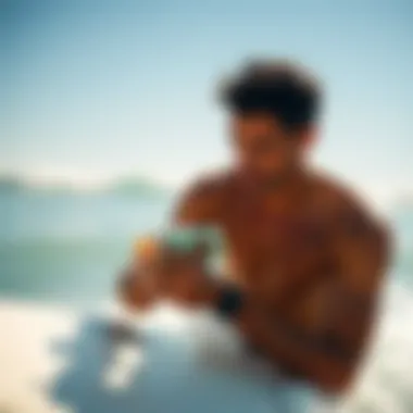 Surfer Using Sun Bum Before Surfing A surfer applying Sun Bum hand lotion before hitting the waves