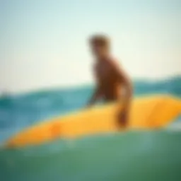 Beginner surfer with a soft-top surfboard