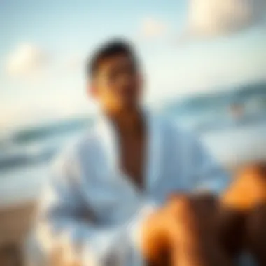 Surfer relaxing by the beach in a towelling robe