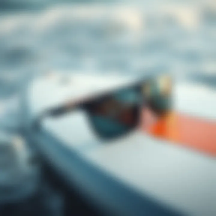 Stylish Glasses on a Surfboard Stylish surfing glasses resting on a surfboard