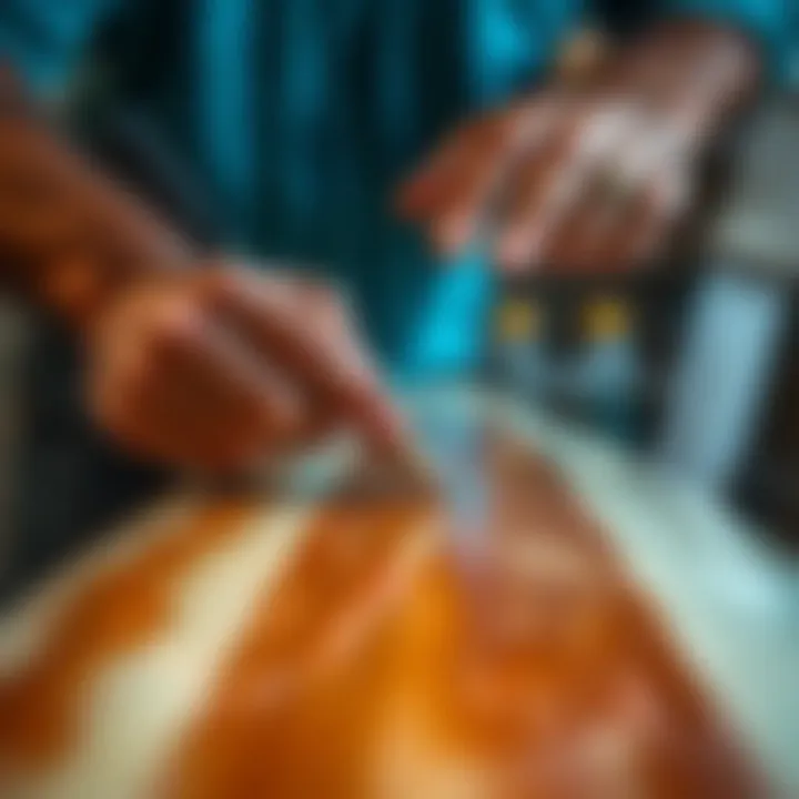 Close-up view of resin application on a surfboard