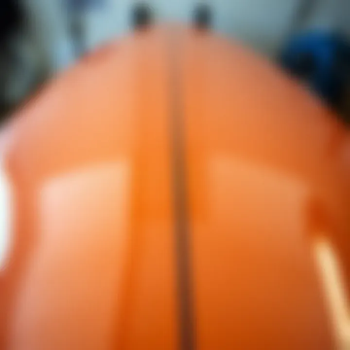 Finished surfboard showcasing a glossy glassing finish