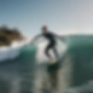 A beginner surfer riding a wave on a suitable surfboard