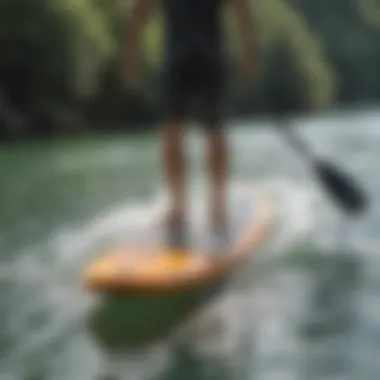 A paddle board in action on varying water conditions