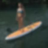 Compact inflatable paddle board on calm waters