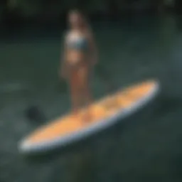 Compact inflatable paddle board on calm waters