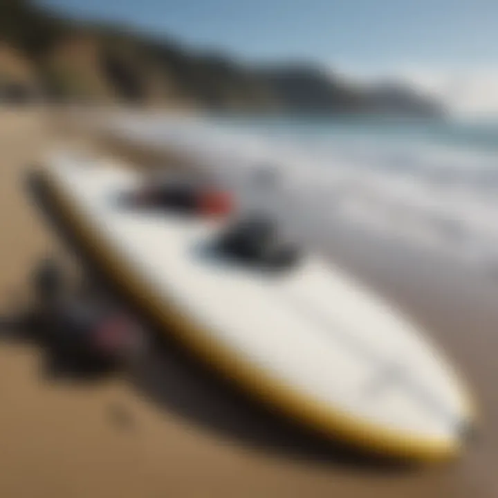 Close-up of surfboards and safety gear on the beach