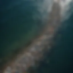 Aerial view of the ocean showcasing plastic debris