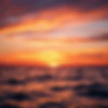 Sunset Over Tranquil Waters A vibrant sunset casting warm hues over the ocean