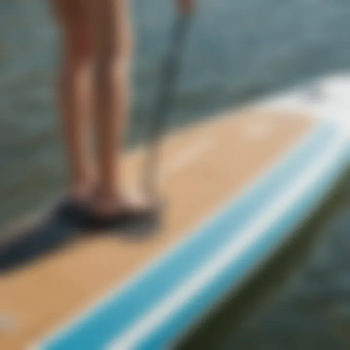 FCS deck pad installed on a paddleboard during a sunny day