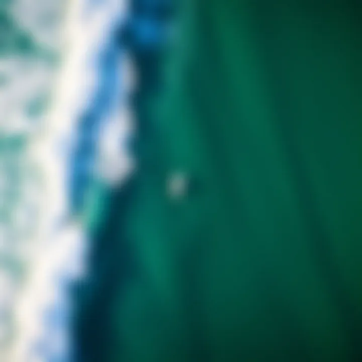 An aerial view of a popular surf spot, demonstrating the perfect conditions for surfers.