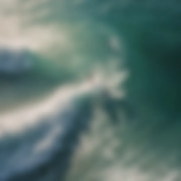 Aerial view of surfers riding waves during swell