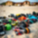 Essential Kite Surfing Equipment Various kite surfing gear laid out on the beach