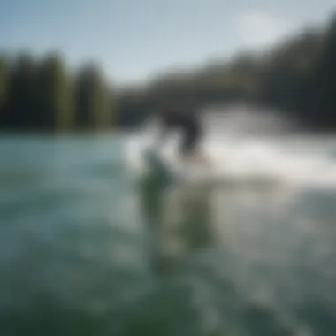 A scenic view of a wake surfing session on the lake