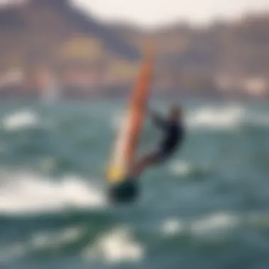 Windsurfer performing a maneuver with rig